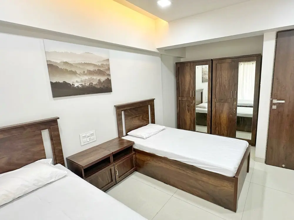 Furnished twin bedroom at Meghdeep