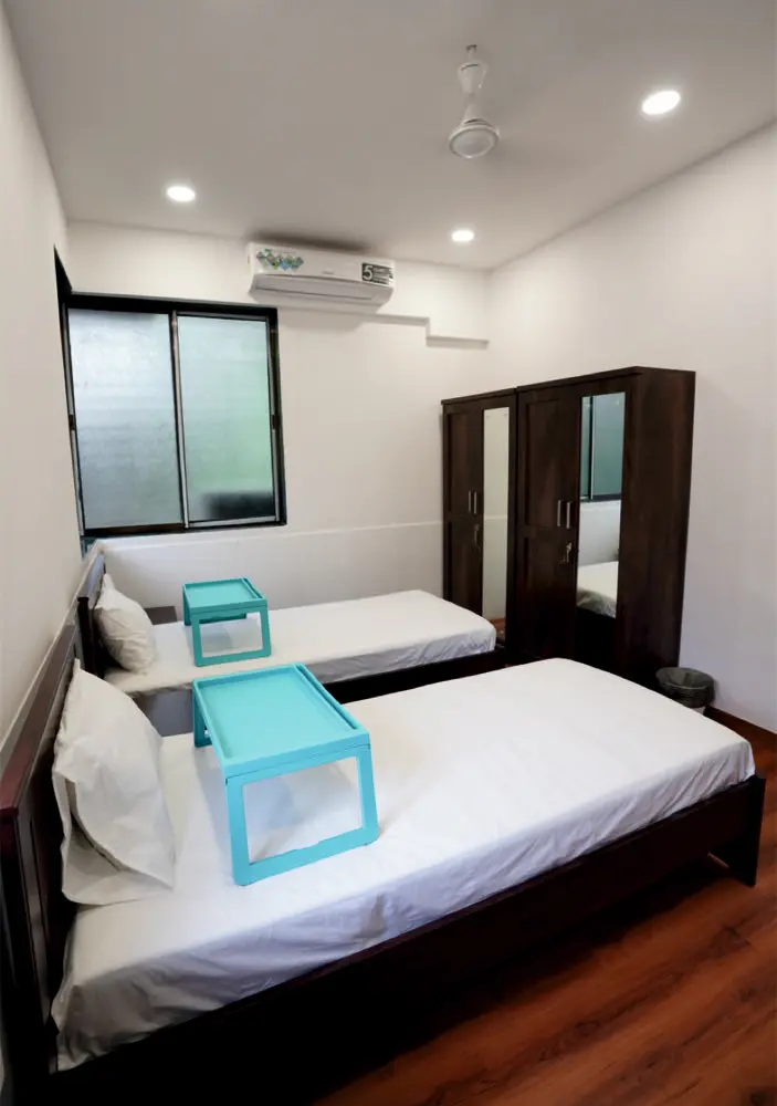 Twin bedroom at Morparia Cottage